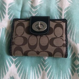 Coach Black and Tan small bifold wallet